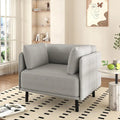 Moderner gepolsterter Loungesessel mit Metallbeinen und Kissen