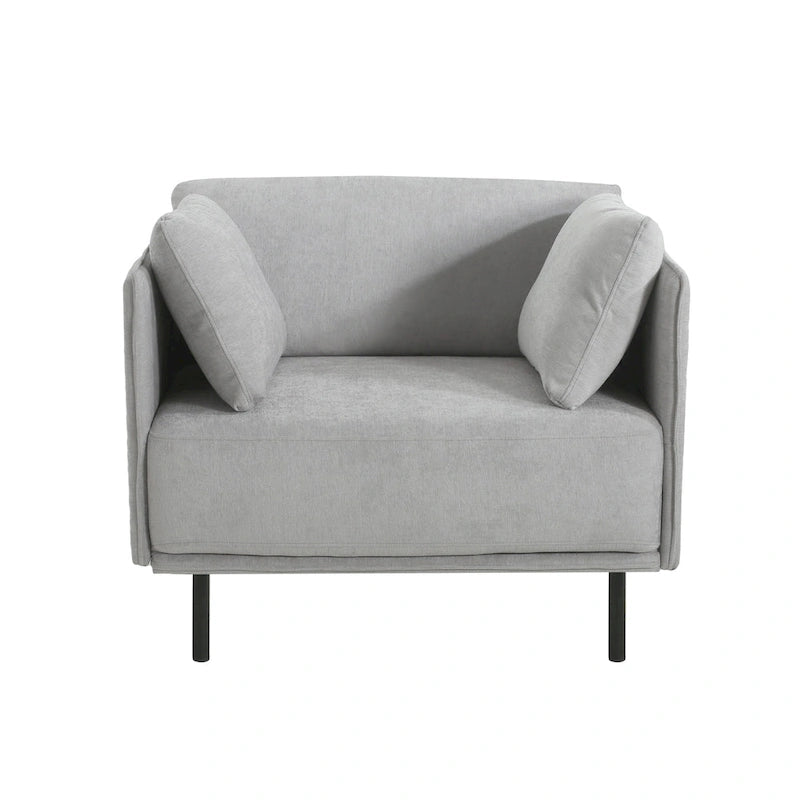 Moderner gepolsterter Loungesessel mit Metallbeinen und Kissen