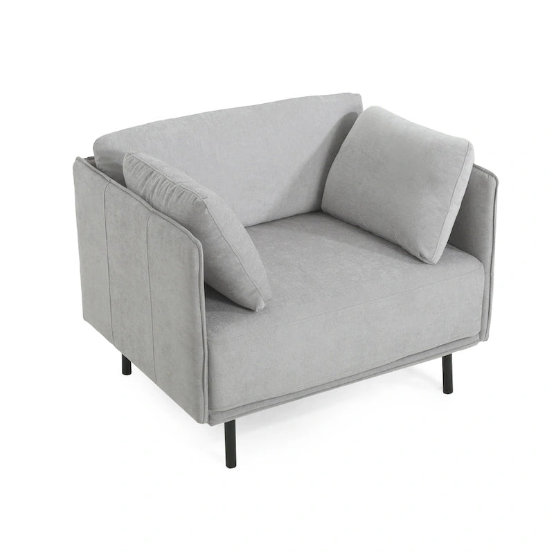 Moderner gepolsterter Loungesessel mit Metallbeinen und Kissen