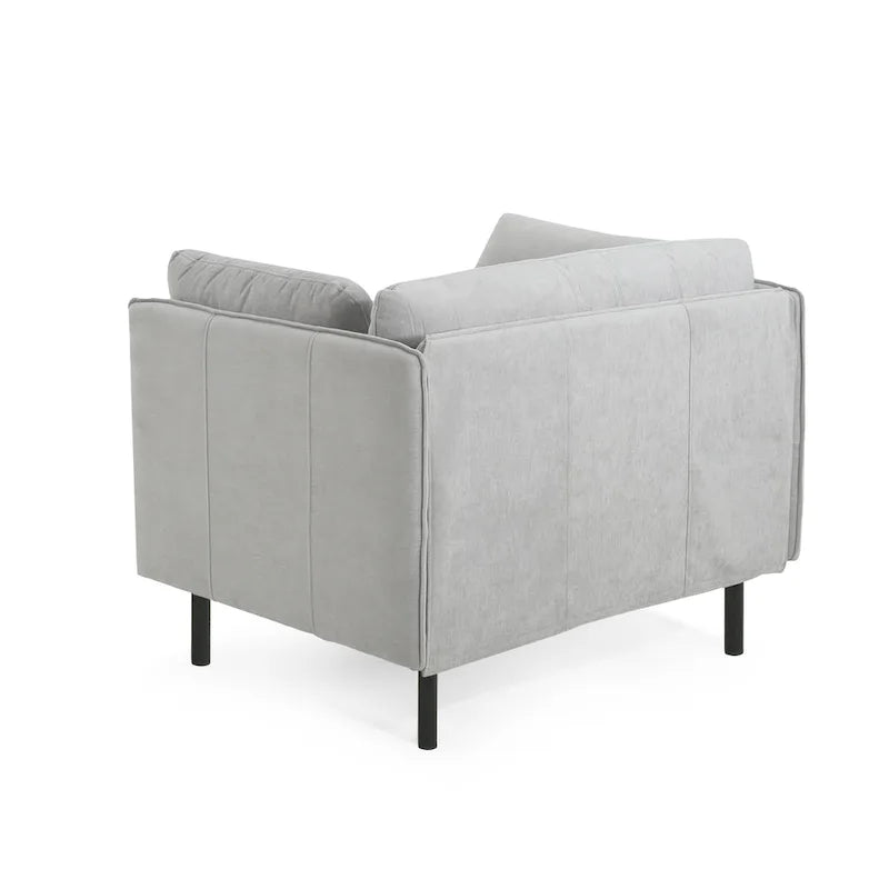 Moderner gepolsterter Loungesessel mit Metallbeinen und Kissen