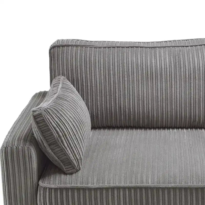 Modernes Cordsofa für drei Personen mit gerollten Armlehnen und abnehmbaren Kissen