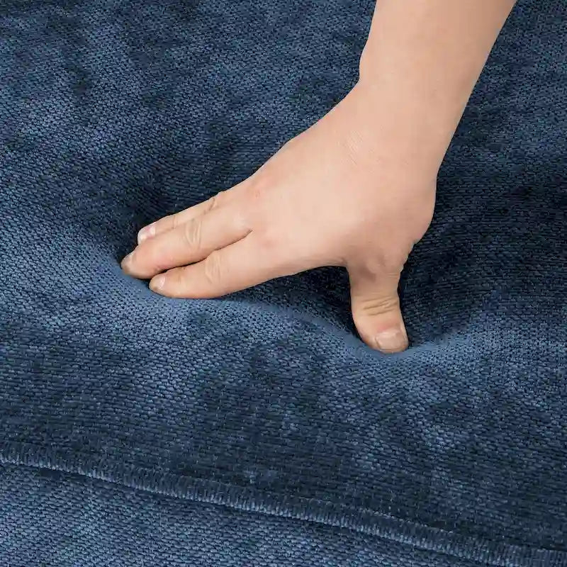 Modernes Cordsofa für drei Personen mit gerollten Armlehnen und abnehmbaren Kissen