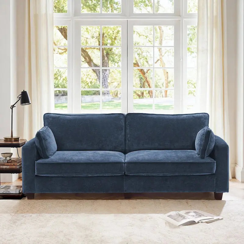 Modernes Cordsofa für drei Personen mit gerollten Armlehnen und abnehmbaren Kissen