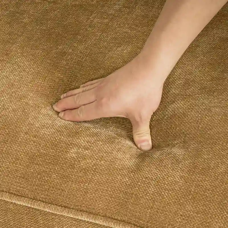 Modernes Cordsofa für drei Personen mit gerollten Armlehnen und abnehmbaren Kissen